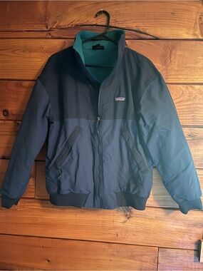 Patagonia Navy Bomber Jacket with Teal Fleece Lining